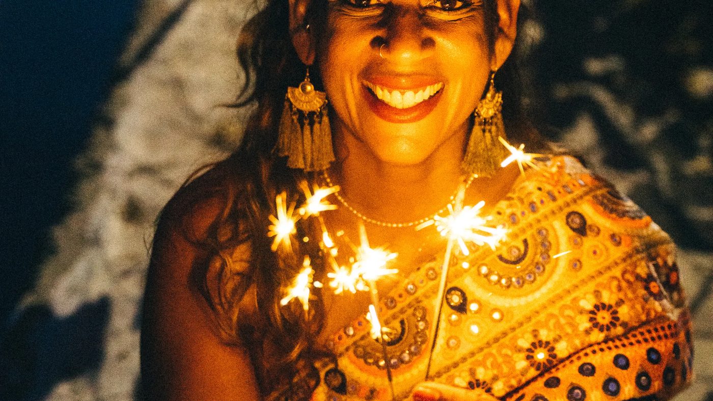 Woman celebrating Diwali in festive Odhini wear